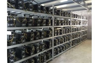 Large-scale mining farm with rows of mining machines